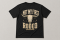 Not My First Rodeo Cave Apparel black T-shirt